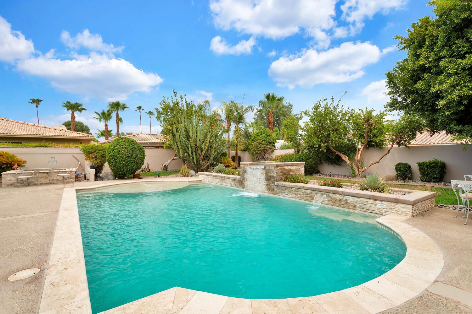 43920 Culebra Lane Bermuda Dunes, CA 92203 - Photo 54 of 66 a view of a swimming pool with a yard