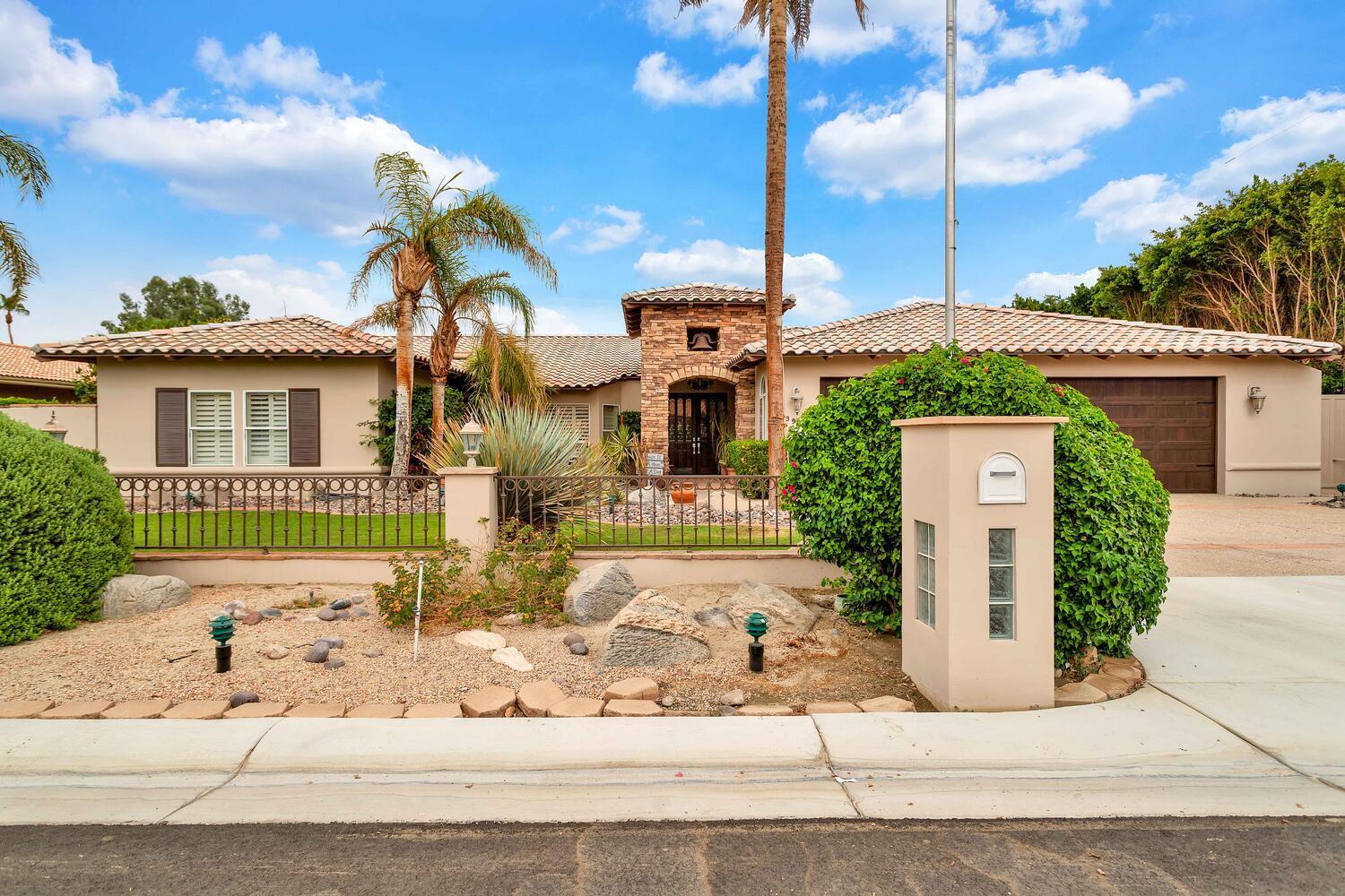 43920 Culebra Lane Bermuda Dunes, CA 92203 - Photo 66 of 66 a front view of a house with a garden