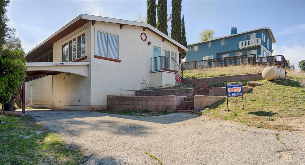 14826 Sandy Ridge Road Lake Hughes, CA 93532 - Photo 1 of 1 front of house w balcony and space under house