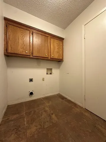 a view of a livingroom with wooden floor