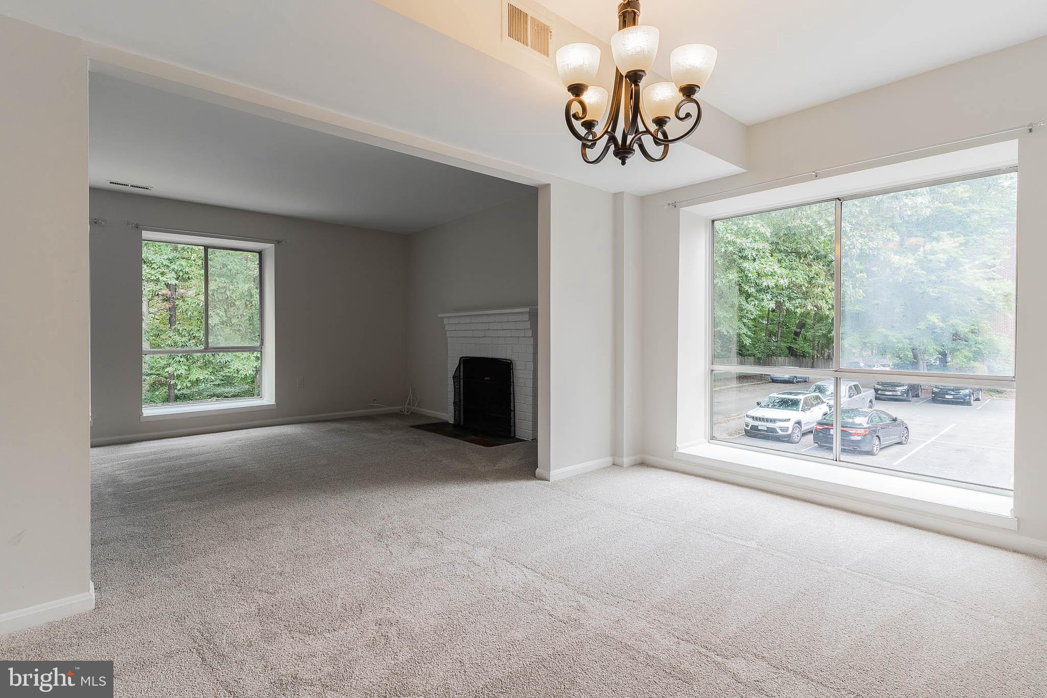 3840 Persimmon Circle Fairfax, VA 22031 - Photo 8 of 25 a view of a livingroom with an empty space and a window