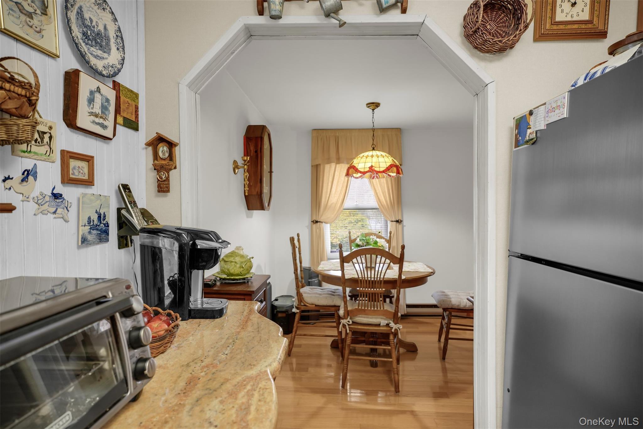 103 Wauwepex Trail Ridge, NY 11961 - Photo 11 of 25 a view of a livingroom with furniture and a flat screen tv
