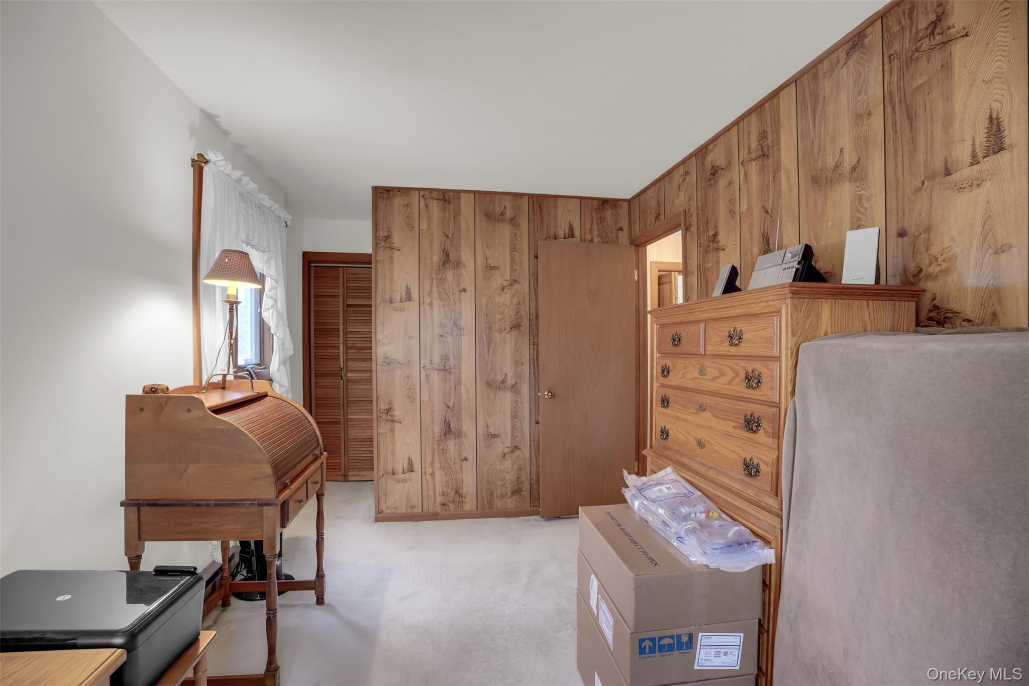 103 Wauwepex Trail Ridge, NY 11961 - Photo 16 of 25 a room with furniture and a closet