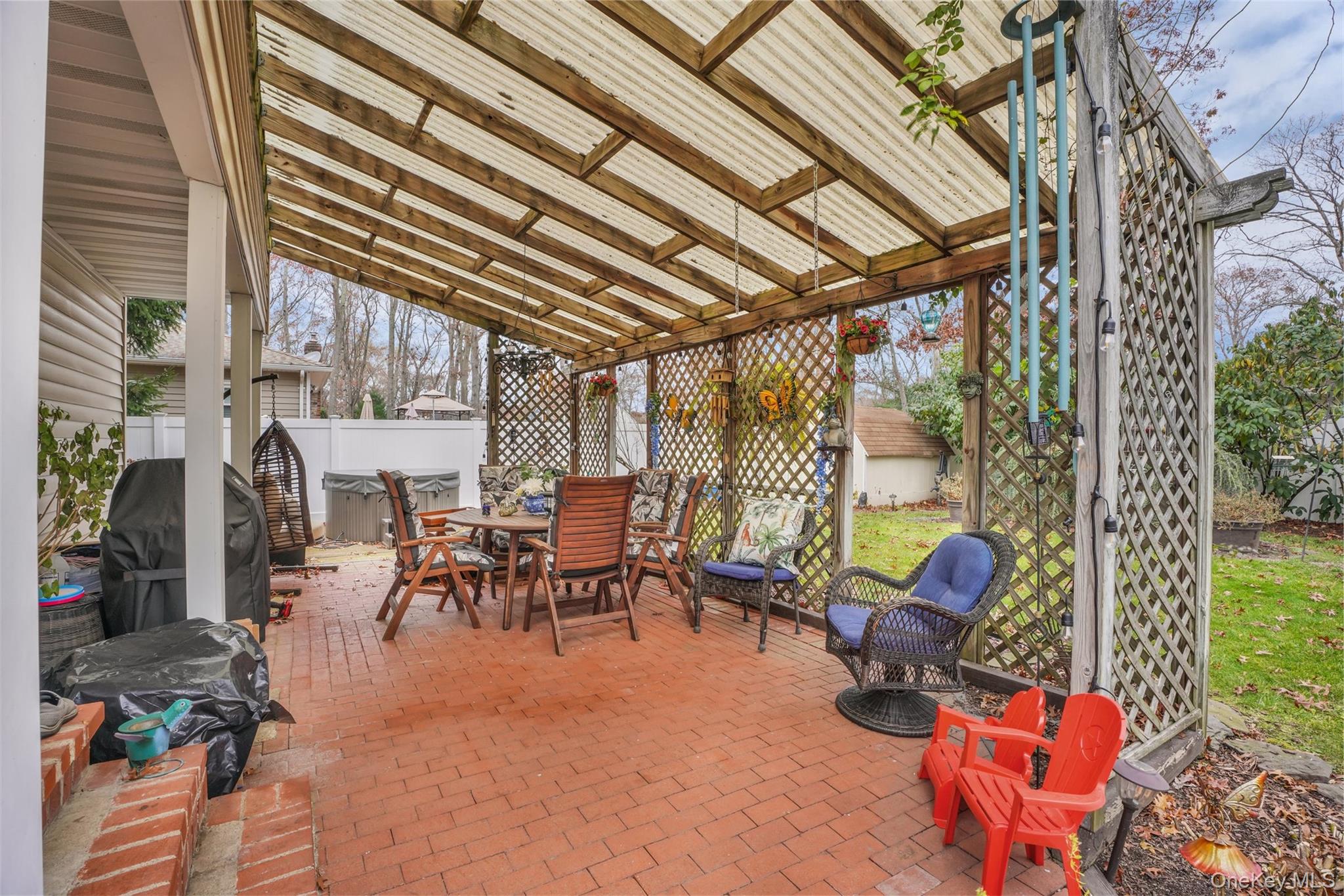 103 Wauwepex Trail Ridge, NY 11961 - Photo 23 of 25 a outdoor space with furniture