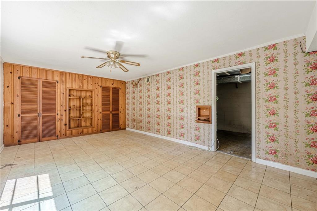 1502 North Druid Hills Road Brookhaven, GA 30319 - Photo 31 of 46 a view of a livingroom with a ceiling fan and window