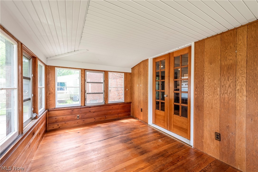 21779 Eaton Road Cleveland, OH 44126 - Photo 15 of 46 Unfurnished sunroom featuring vaulted ceiling