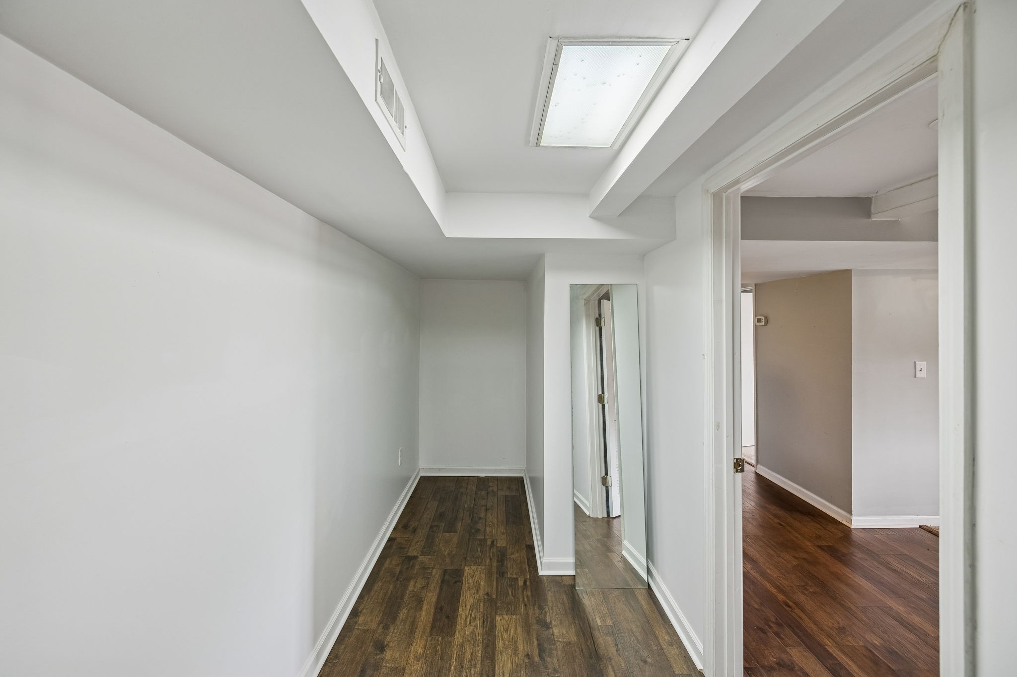 172 Littell Circle West Tracy City, TN 37387 - Photo 37 of 59 a view of a hallway with wooden floor and staircase