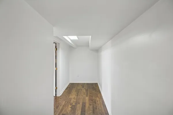 a bedroom with furniture and a fireplace