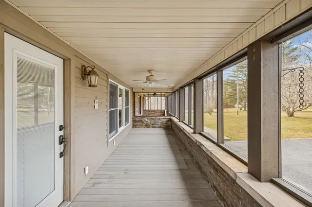a view of gallery with wooden floor