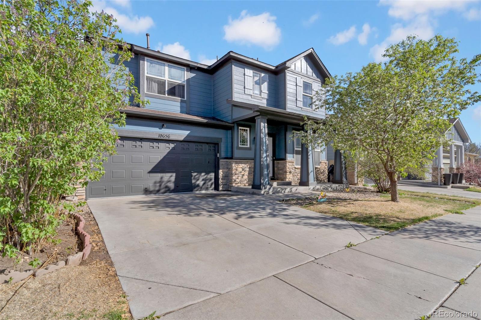 10656 Racine Circle Commerce City, CO 80022 - Photo 27 of 39 a view of a house with a street