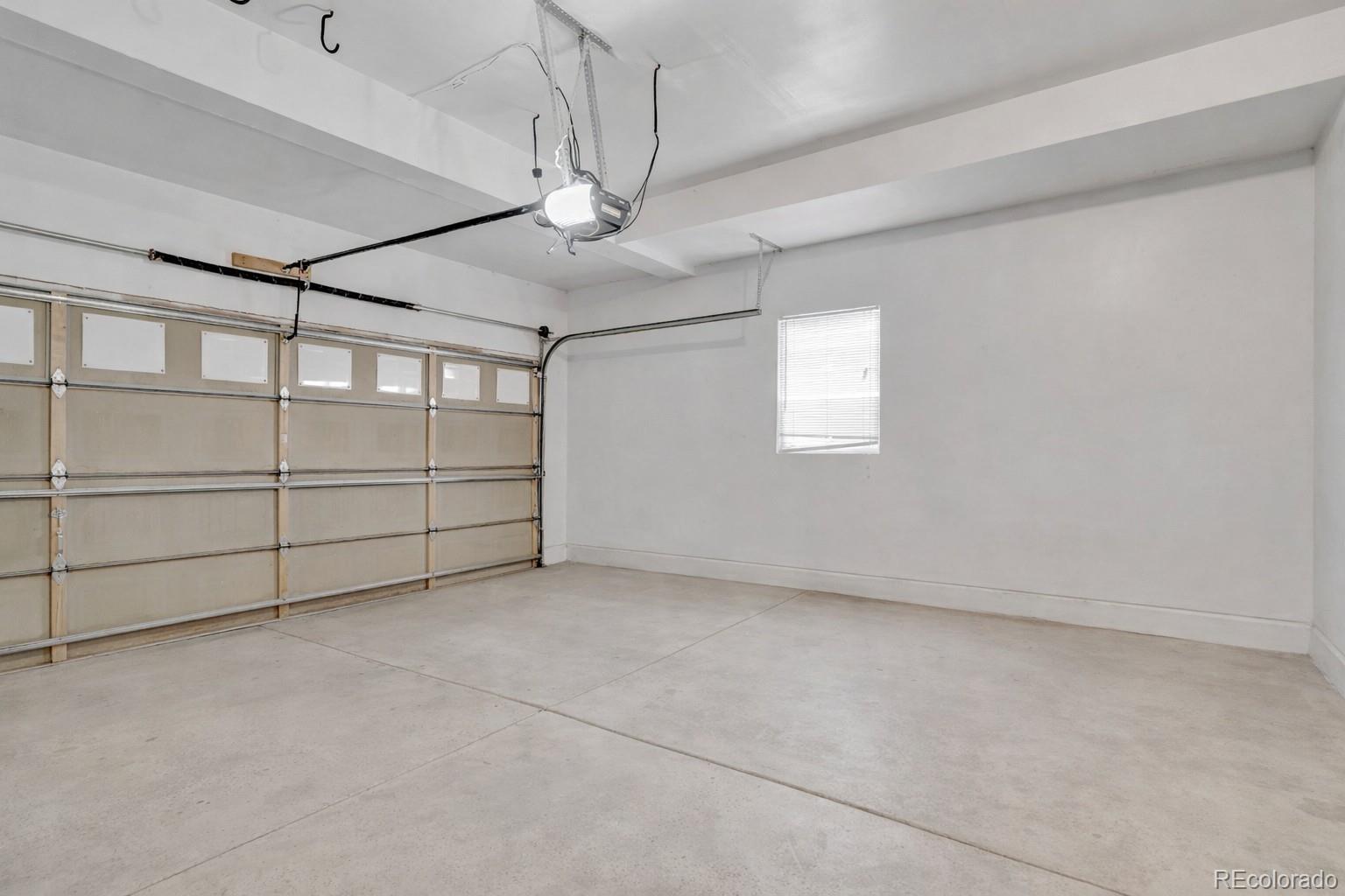 10656 Racine Circle Commerce City, CO 80022 - Photo 36 of 39 a view of an empty room with a window