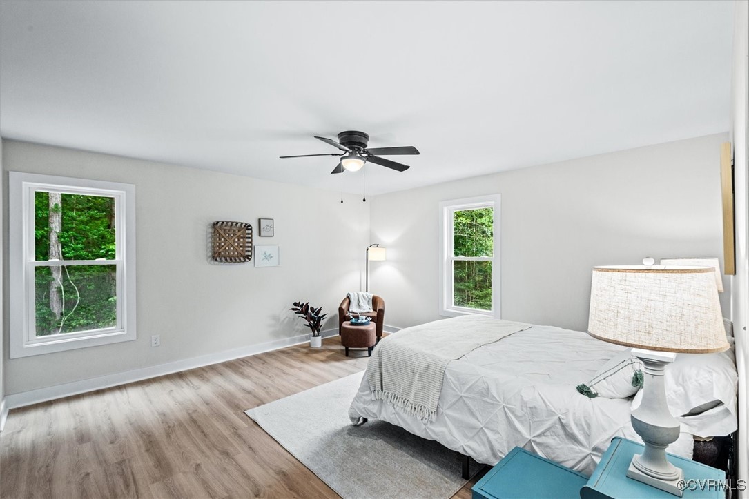 487 Deep Landing Road Tappahannock, VA 22560 - Photo 14 of 38 Large primary suite with views of all the trees, p