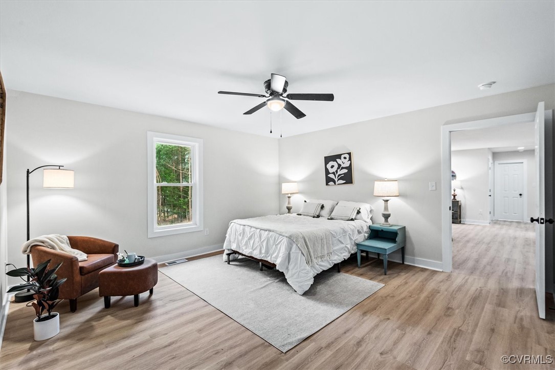 487 Deep Landing Road Tappahannock, VA 22560 - Photo 15 of 38 Spacious bedroom with walk in closet, luxury vinyl