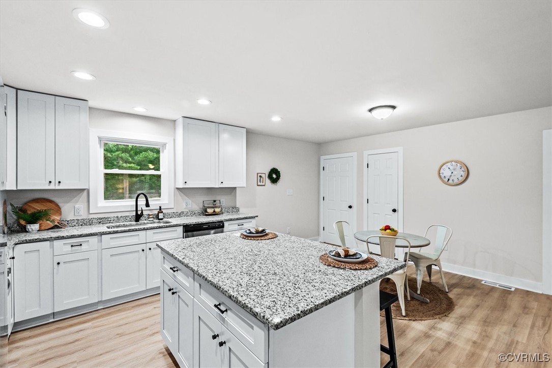 487 Deep Landing Road Tappahannock, VA 22560 - Photo 10 of 38 beyond dining is pantry and door to laundry room a