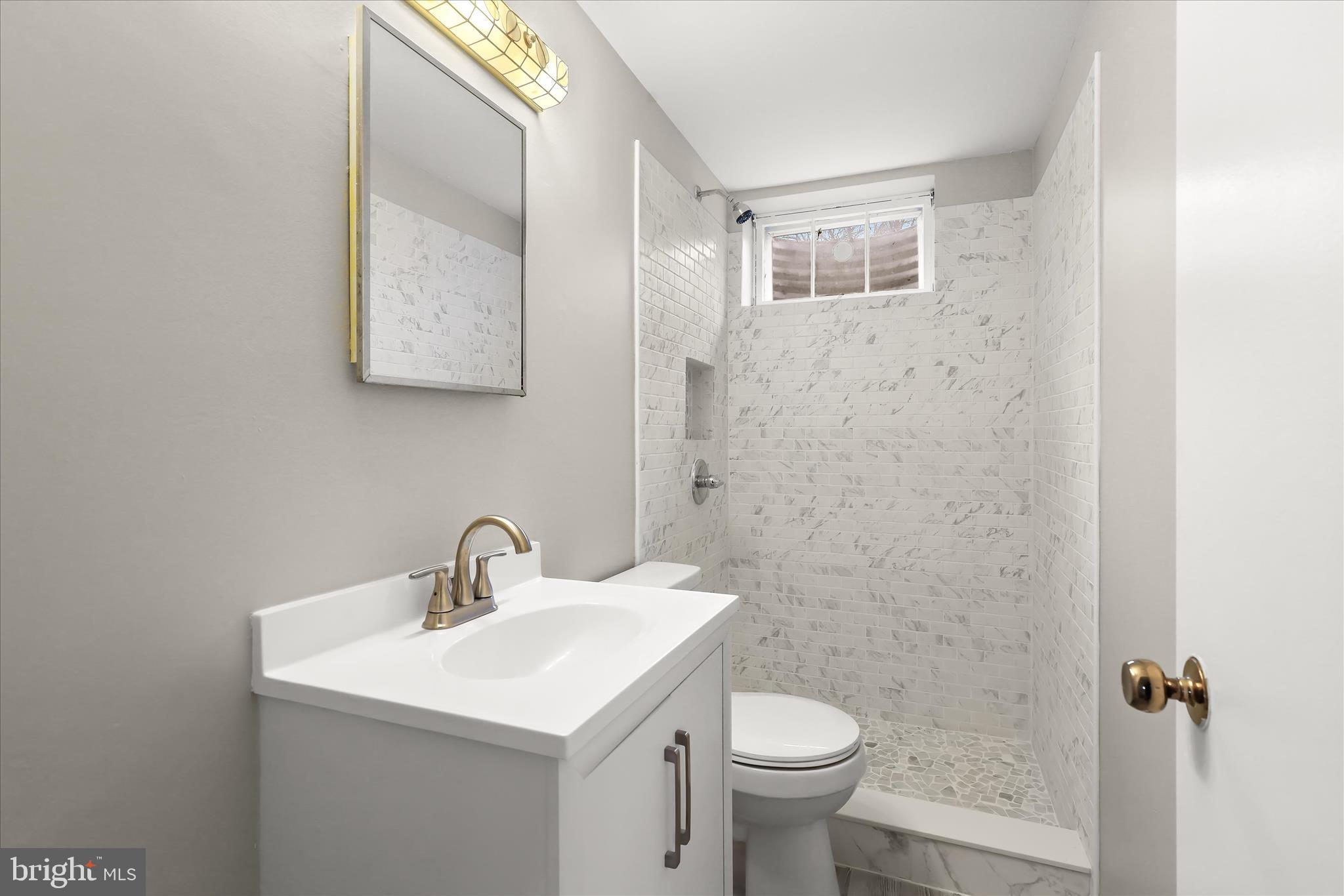 7449 Prince George Road Pikesville, MD 21208 - Photo 28 of 37 Lower level full bathroom