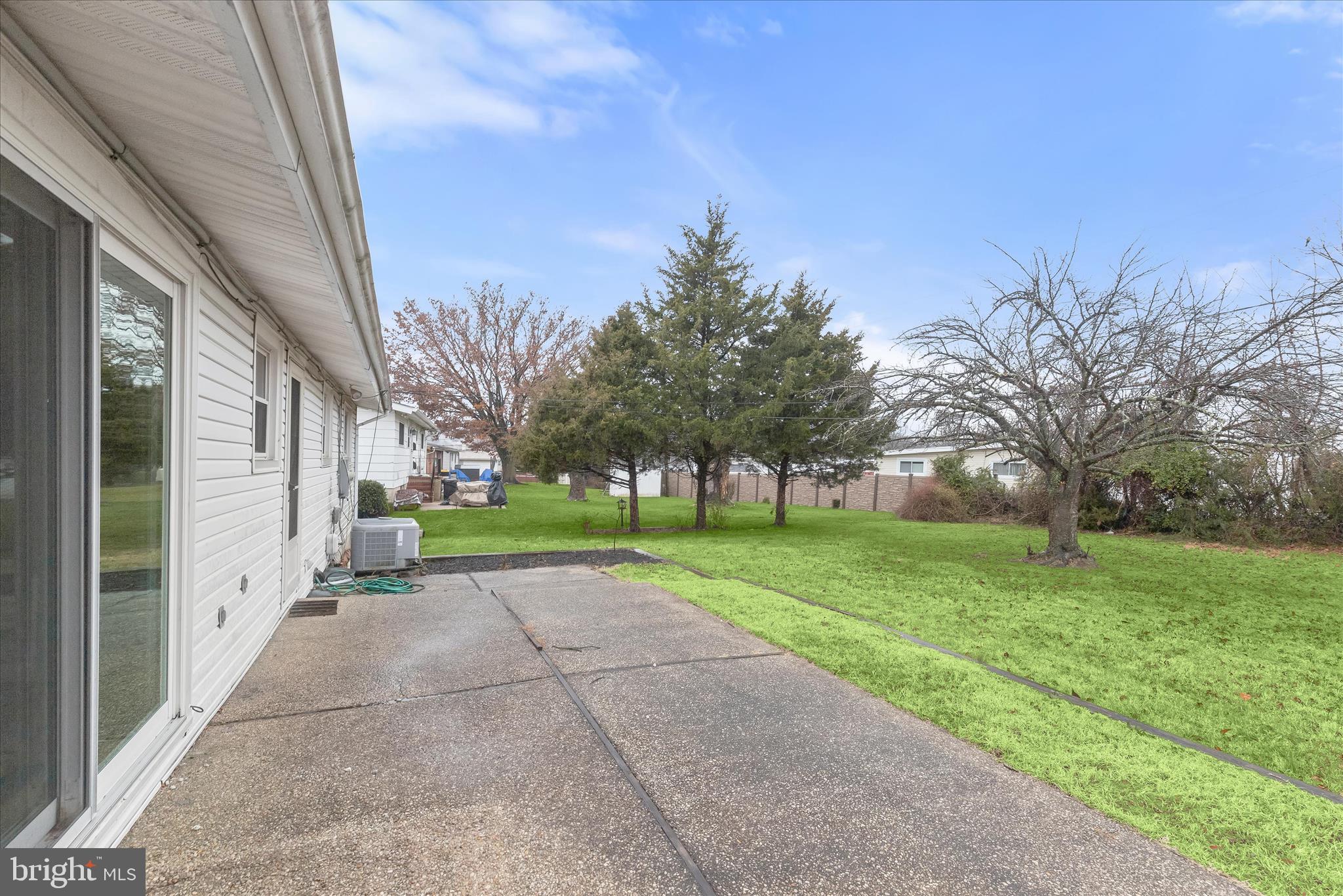 7449 Prince George Road Pikesville, MD 21208 - Photo 30 of 37 Patio in landscaped yard