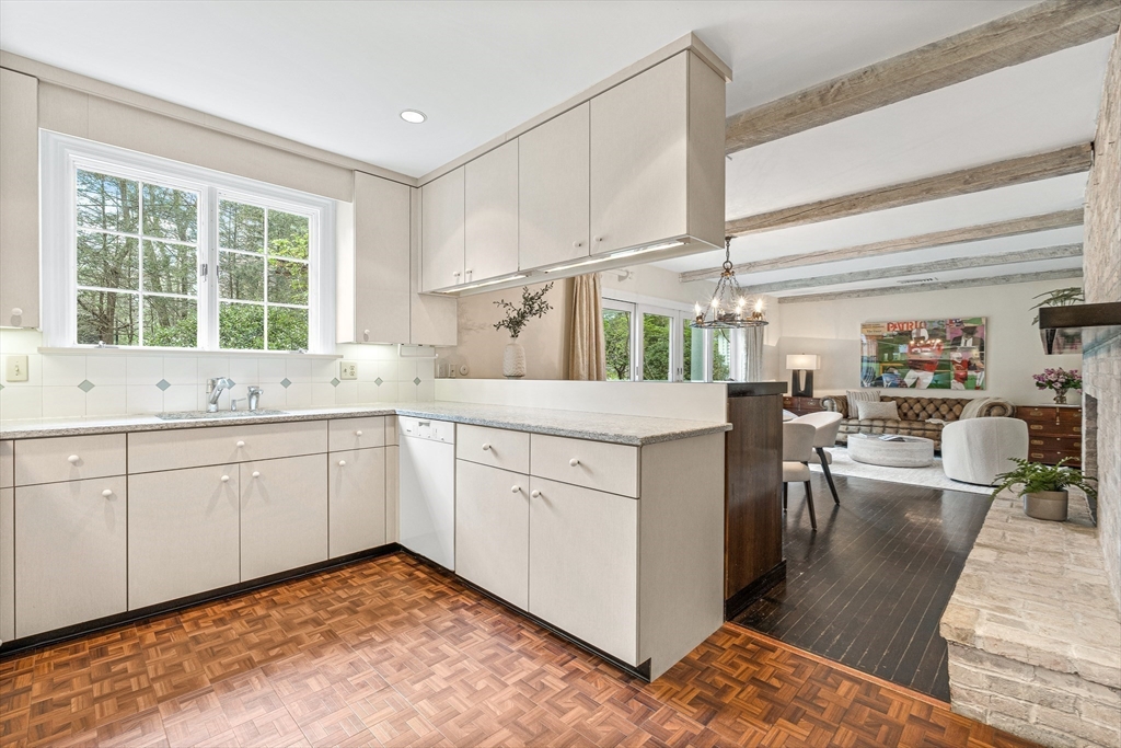 5 Deer Path Lane Weston, MA 02493 - Photo 11 of 26 a kitchen with a sink stove and cabinets