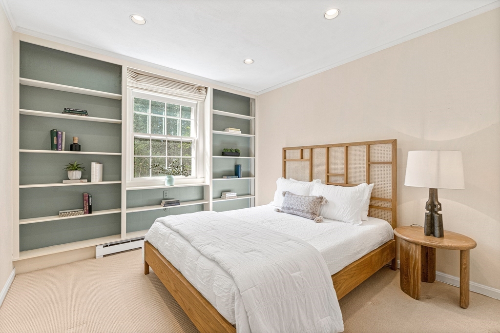 5 Deer Path Lane Weston, MA 02493 - Photo 20 of 26 a bedroom with a large bed and a window