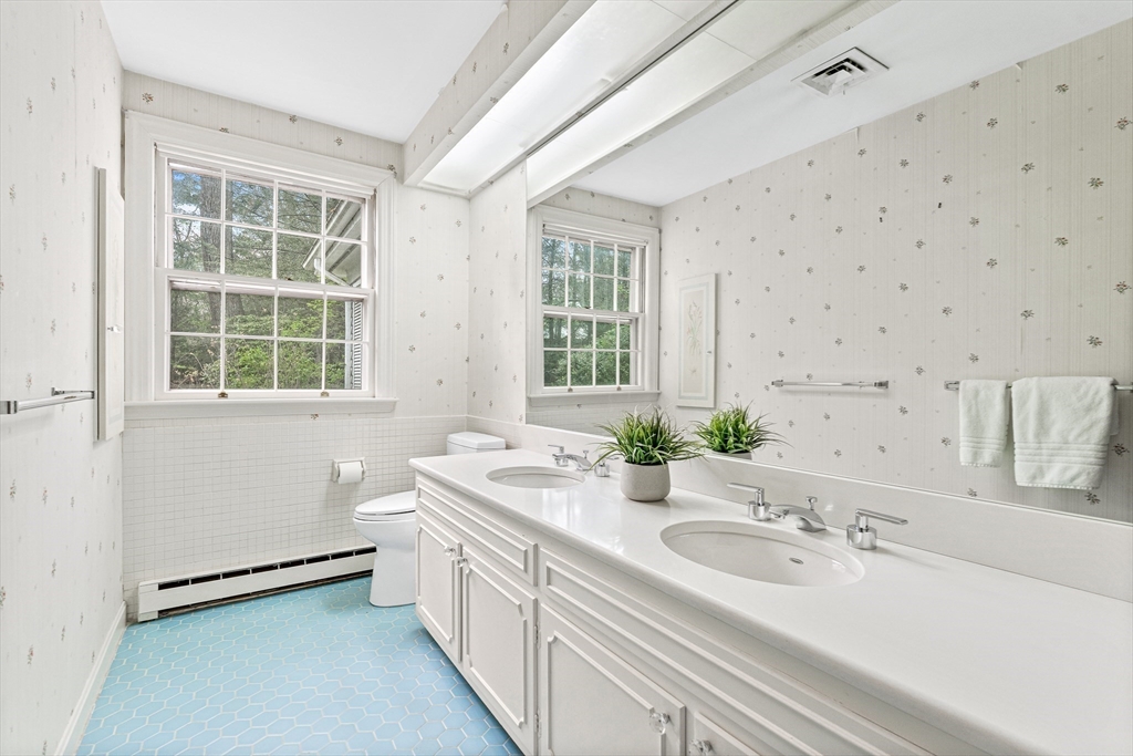 5 Deer Path Lane Weston, MA 02493 - Photo 22 of 26 a bathroom with a sink and a bathtub