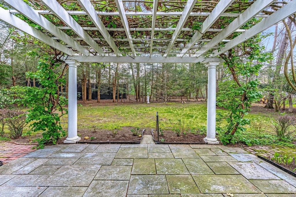 5 Deer Path Lane Weston, MA 02493 - Photo 25 of 26 a view of a house with backyard from a patio