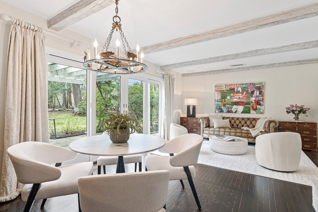 5 Deer Path Lane Weston, MA 02493 - Photo 8 of 26 a view of a dining room with furniture wooden floor and chandelier