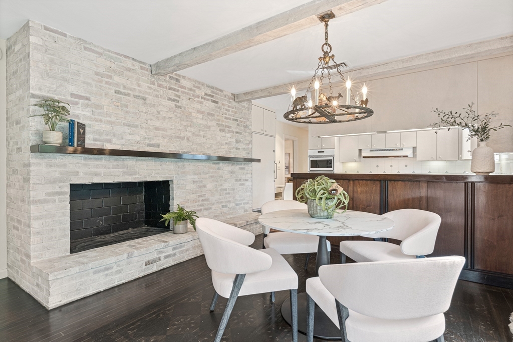 5 Deer Path Lane Weston, MA 02493 - Photo 10 of 26 a dining room with furniture a chandelier and window