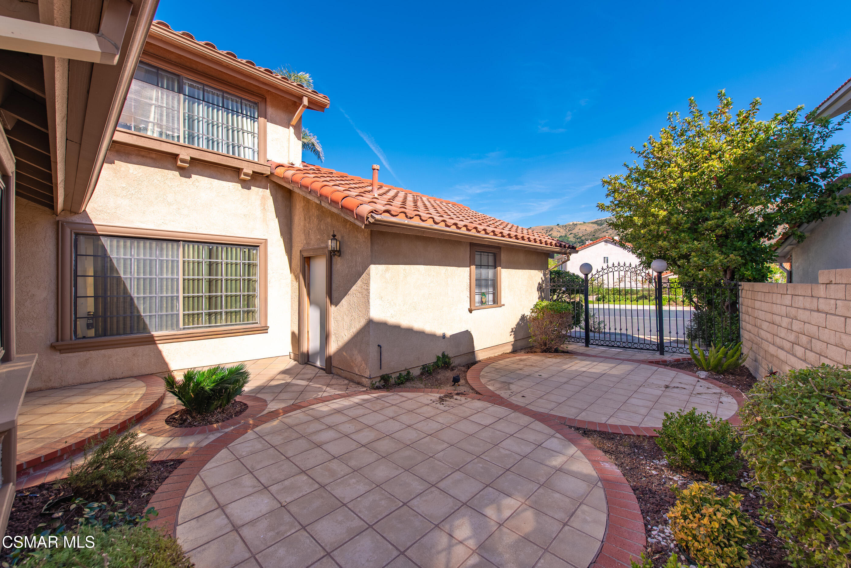 12036 Shadow Ridge Way Porter Ranch, CA 91326 - Photo 10 of 35 a house view with a outdoor space