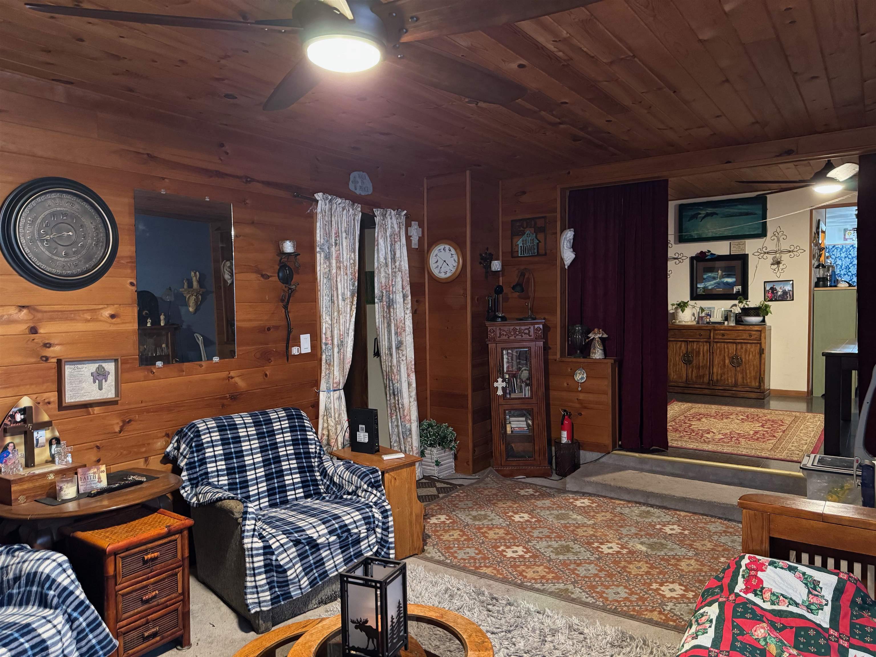 10922 South Stone Road Solon Springs, WI 54873 - Photo 23 of 64 Living room with wood ceiling and wood walls