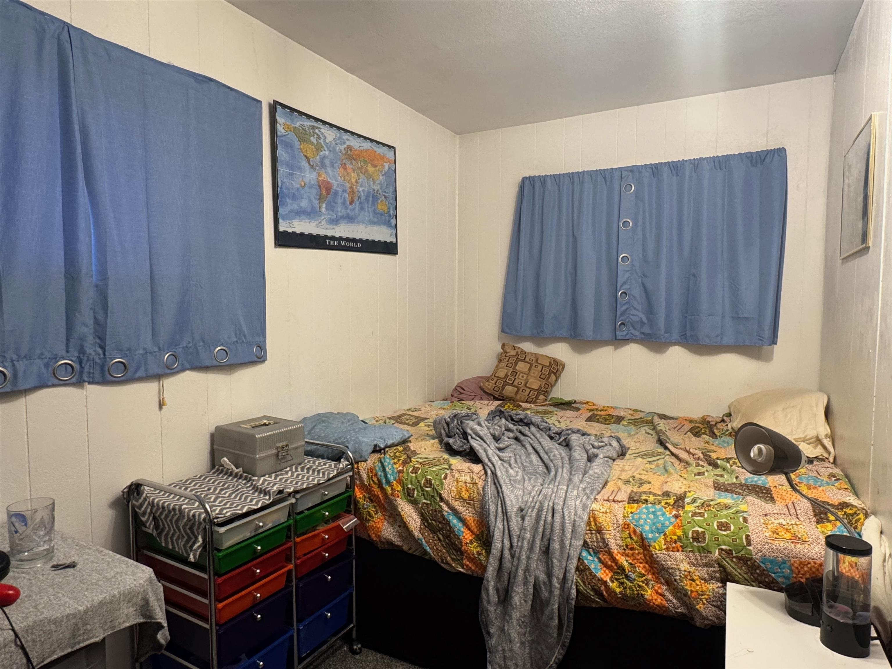 10922 South Stone Road Solon Springs, WI 54873 - Photo 39 of 64 Bedroom featuring wood walls