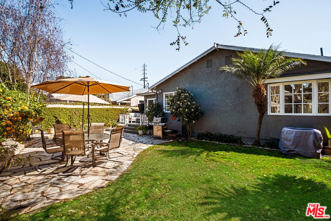 12029 Juniette Street Culver City, CA 90230 - Photo 3 of 4 a view of a chairs and table in backyard