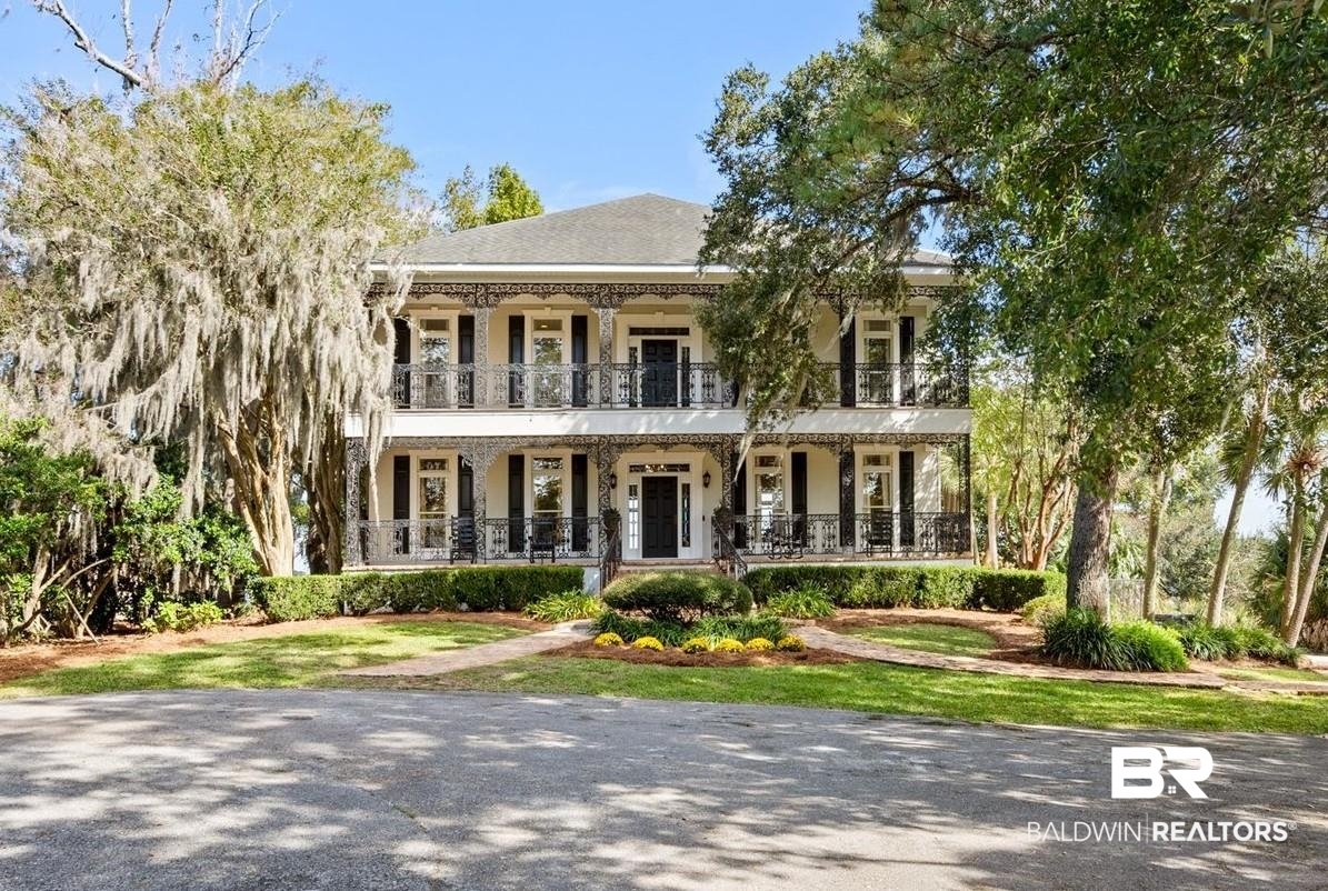 4930 River Trace Theodore, AL 36582 - Photo 1 of 57 View of front of house with a porch and a balcony