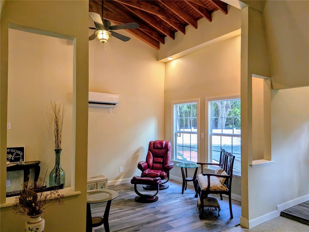 18001 Nelson Road Spring Hill, FL 34610 - Photo 11 of 29 a living room with furniture and wooden floor