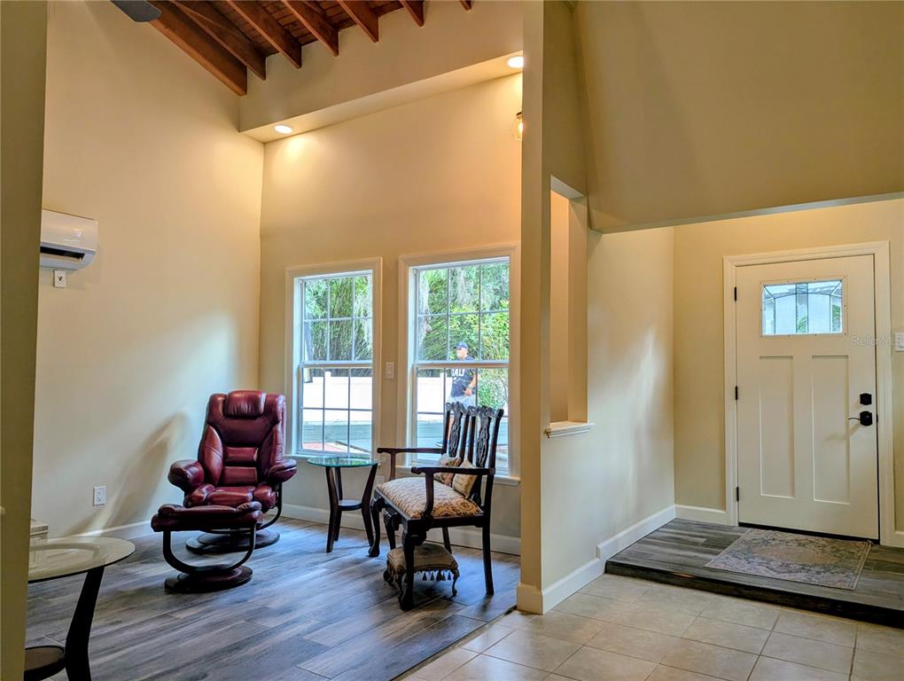 18001 Nelson Road Spring Hill, FL 34610 - Photo 12 of 29 a living room with furniture and wooden floor