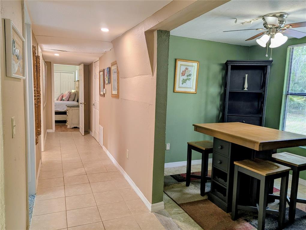 18001 Nelson Road Spring Hill, FL 34610 - Photo 19 of 29 a view of a livingroom with furniture window and wooden floor