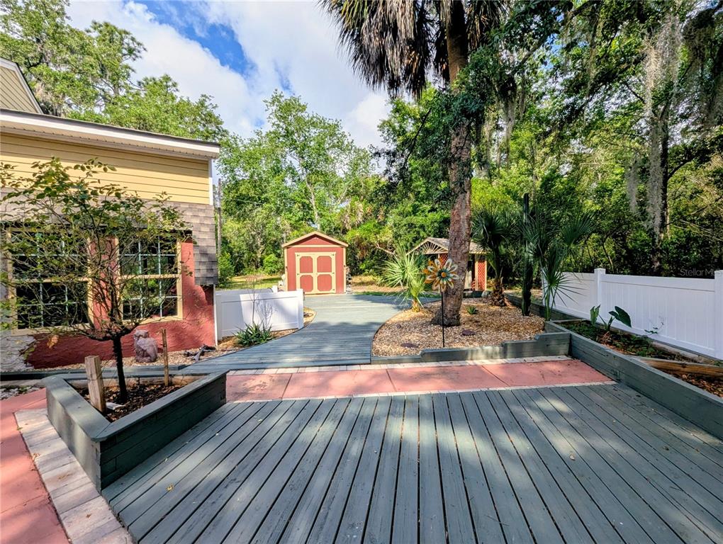 18001 Nelson Road Spring Hill, FL 34610 - Photo 6 of 29 a view of outdoor space with deck and living space