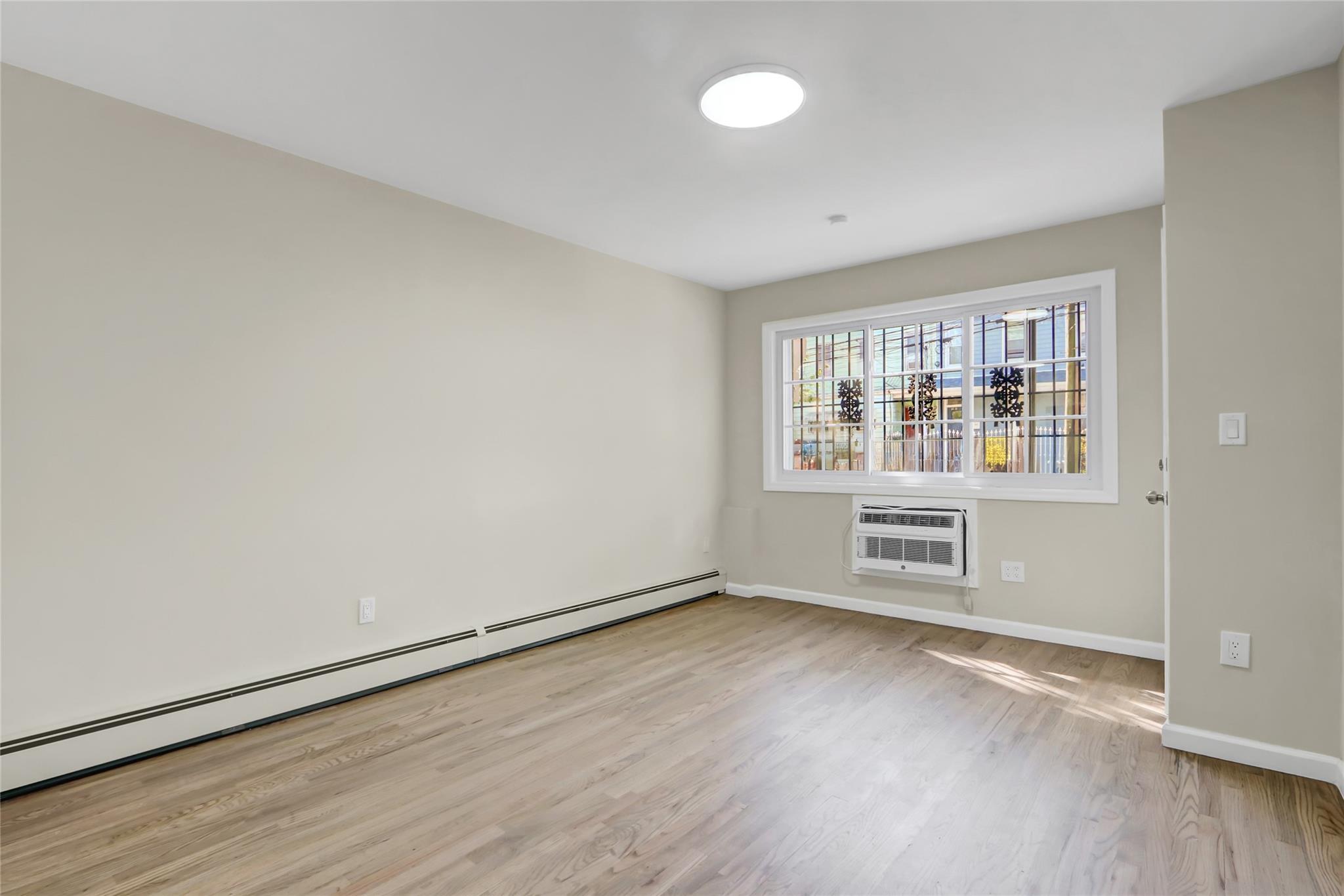 107-03 37th Drive Queens, NY 11368 - Photo 3 of 42