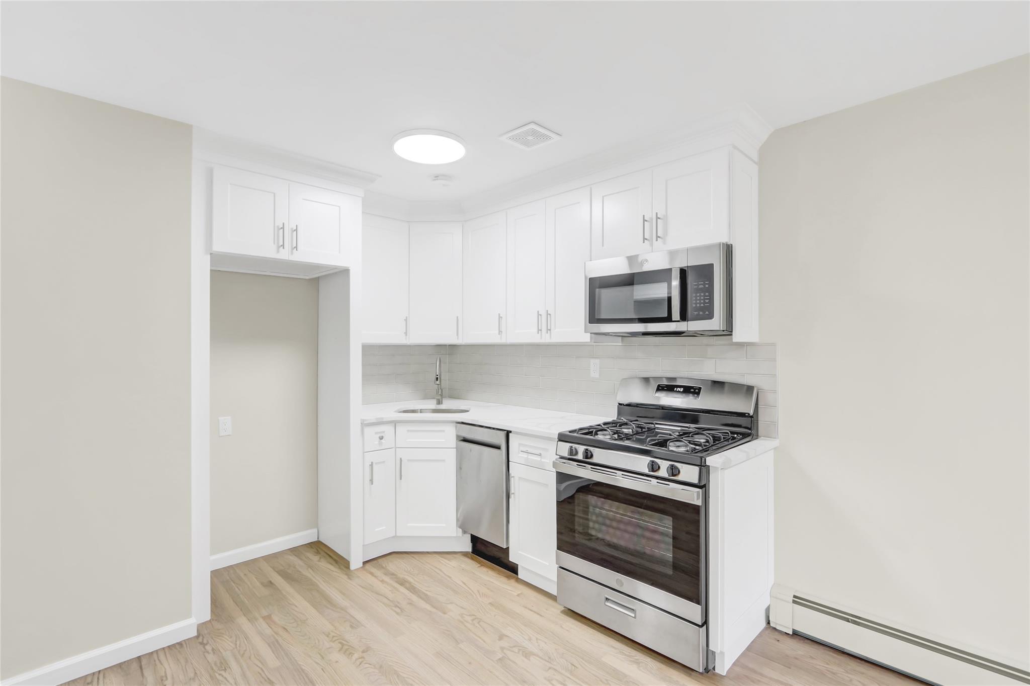 107-03 37th Drive Queens, NY 11368 - Photo 5 of 42