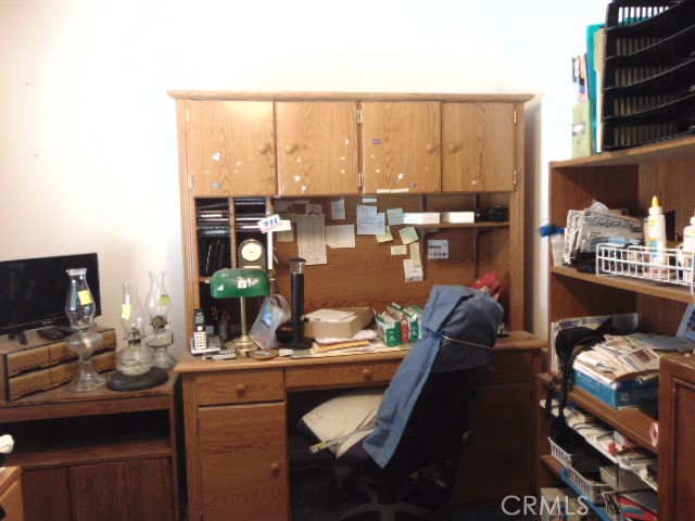 3835 Gardiner Ferry Road, Unit 62 Corning, CA 96021 - Photo 20 of 34 a kitchen with a large window and a table