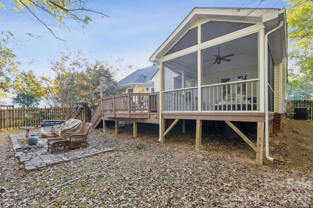 a bedroom with a bed and a painting