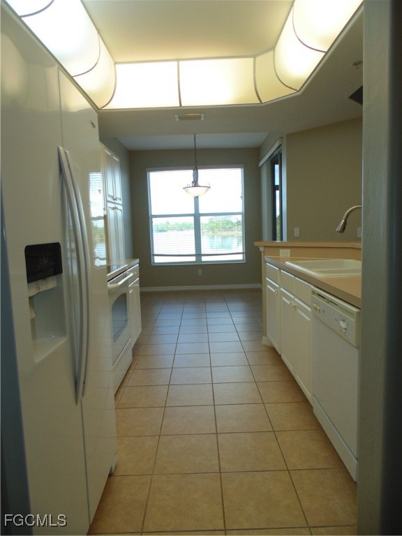 2615 Somerville Loop, Unit 303 Cape Coral, FL 33991 - Photo 11 of 40 a bathroom with a bathtub and a shower