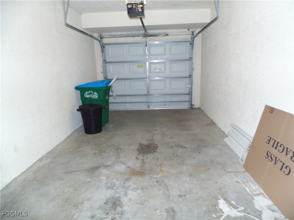 2615 Somerville Loop, Unit 303 Cape Coral, FL 33991 - Photo 31 of 40 a view of a room with shelf
