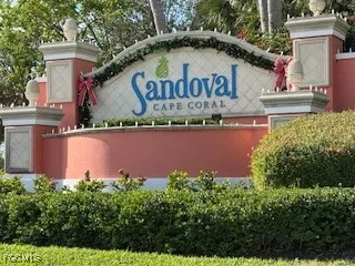 a view of a swimming pool with a yard