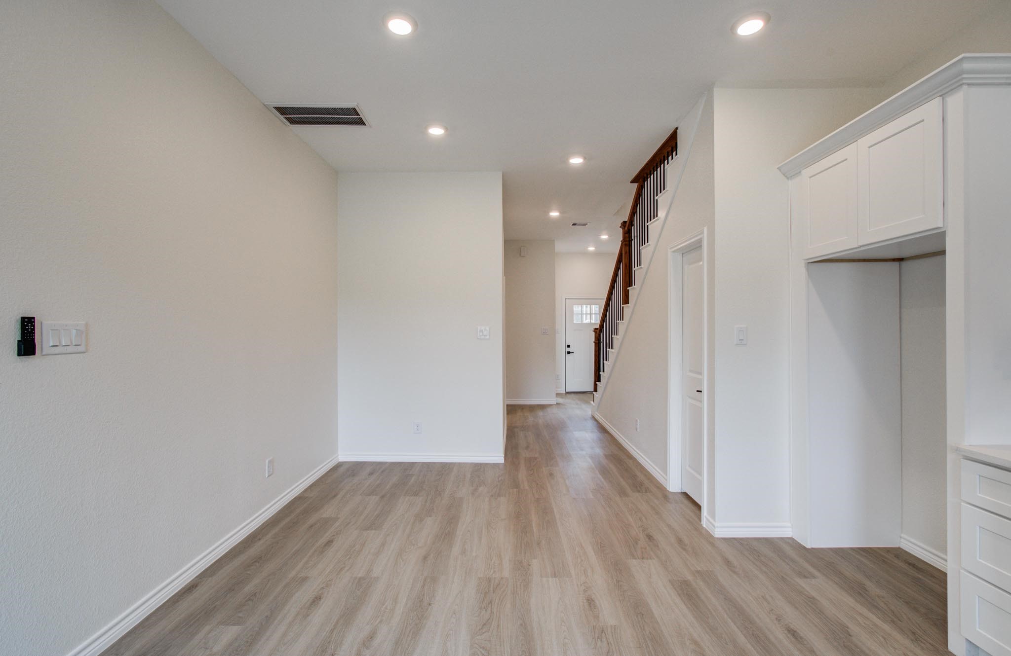 15301 Coaltown Road Willis, TX 77378 - Photo 22 of 38 a view of a hallway with wooden floor