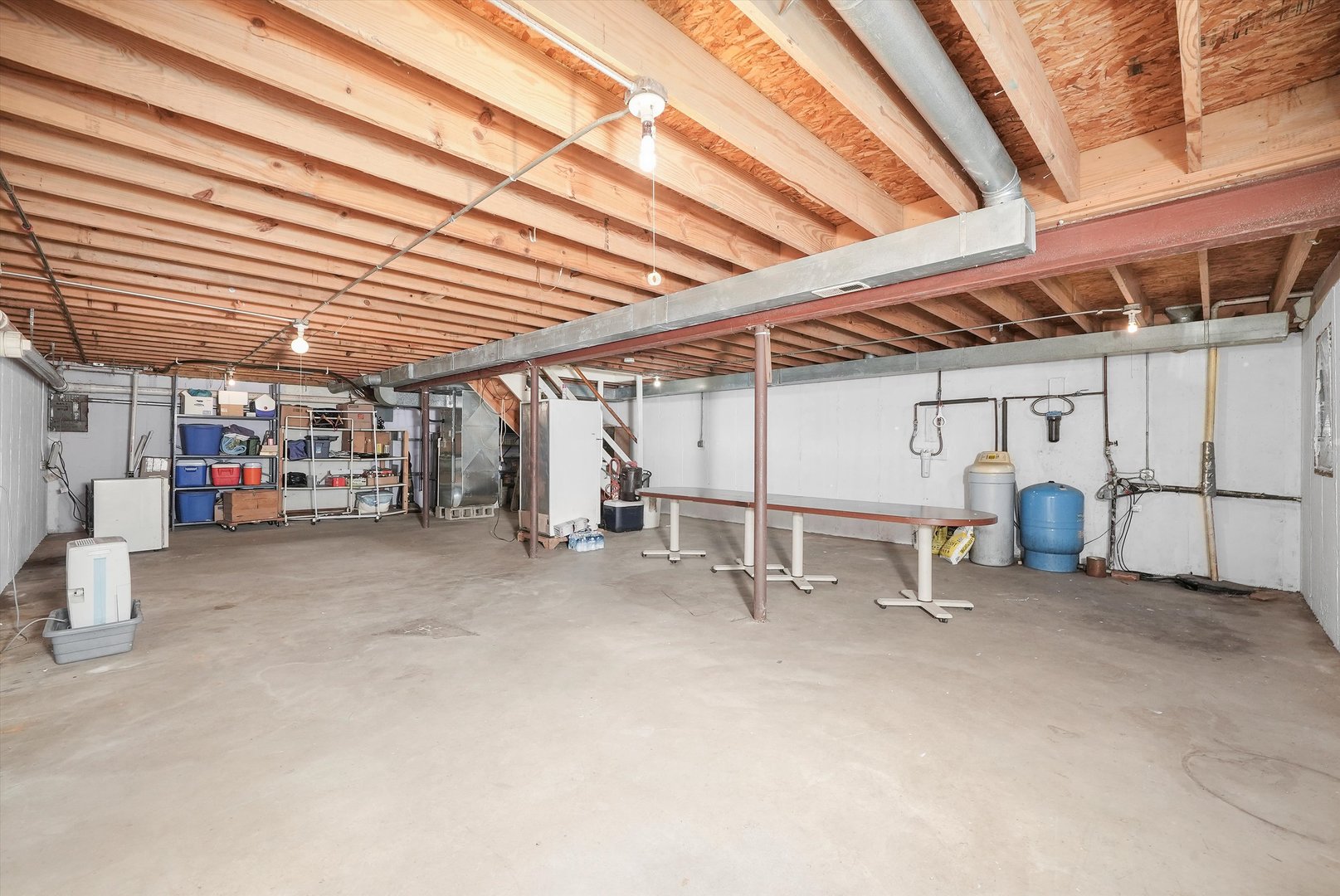 4224 West Offner Road Monee, IL 60449 - Photo 22 of 32 a view of a big room with air conditioner duct and materials on floor