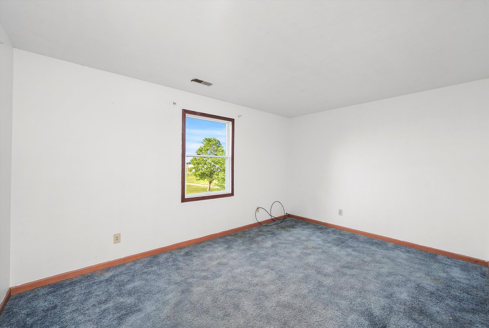 4224 West Offner Road Monee, IL 60449 - Photo 23 of 32 an empty room with windows