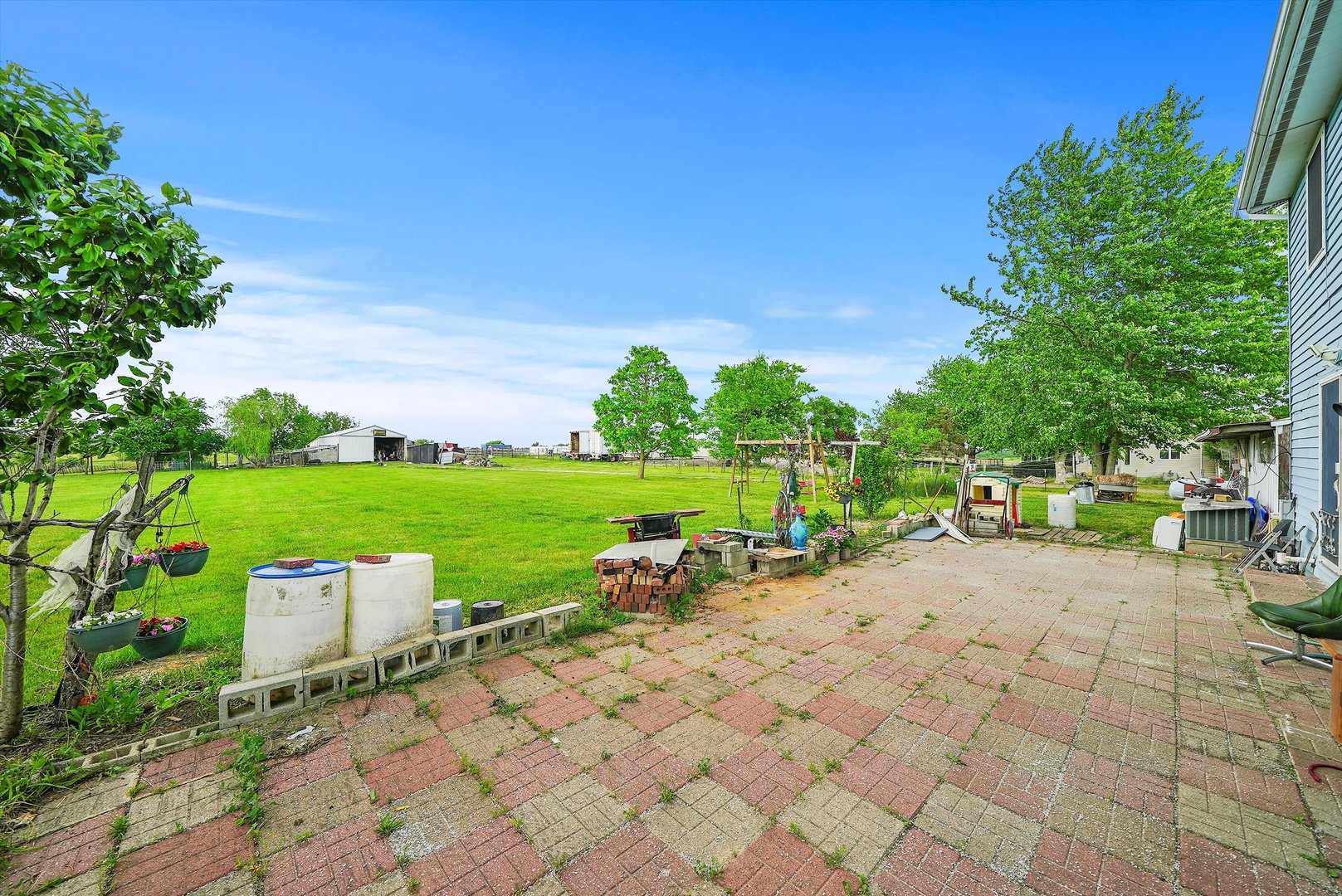 4224 West Offner Road Monee, IL 60449 - Photo 32 of 32 a view of a table and chairs in the garden