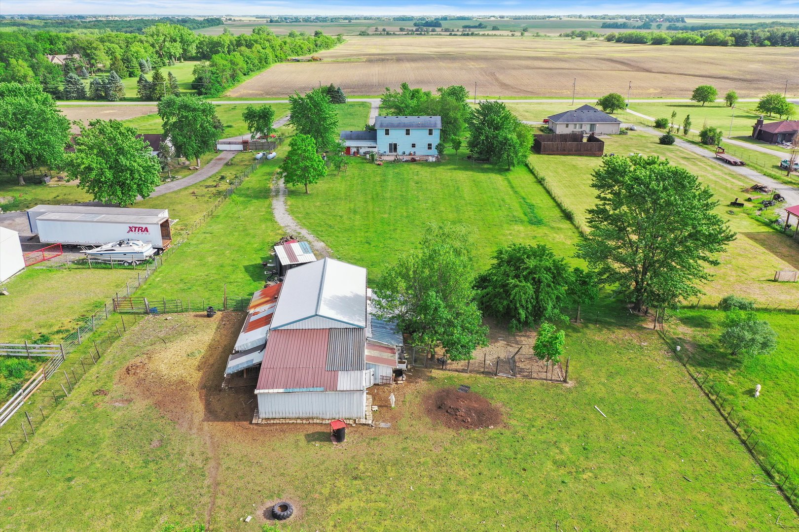 4224 West Offner Road Monee, IL 60449 - Photo 7 of 32 an aerial view of a house with a garden and lake view