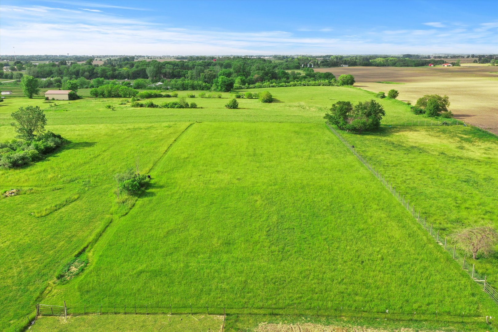 4224 West Offner Road Monee, IL 60449 - Photo 9 of 32 a view of a golf course with a lake view