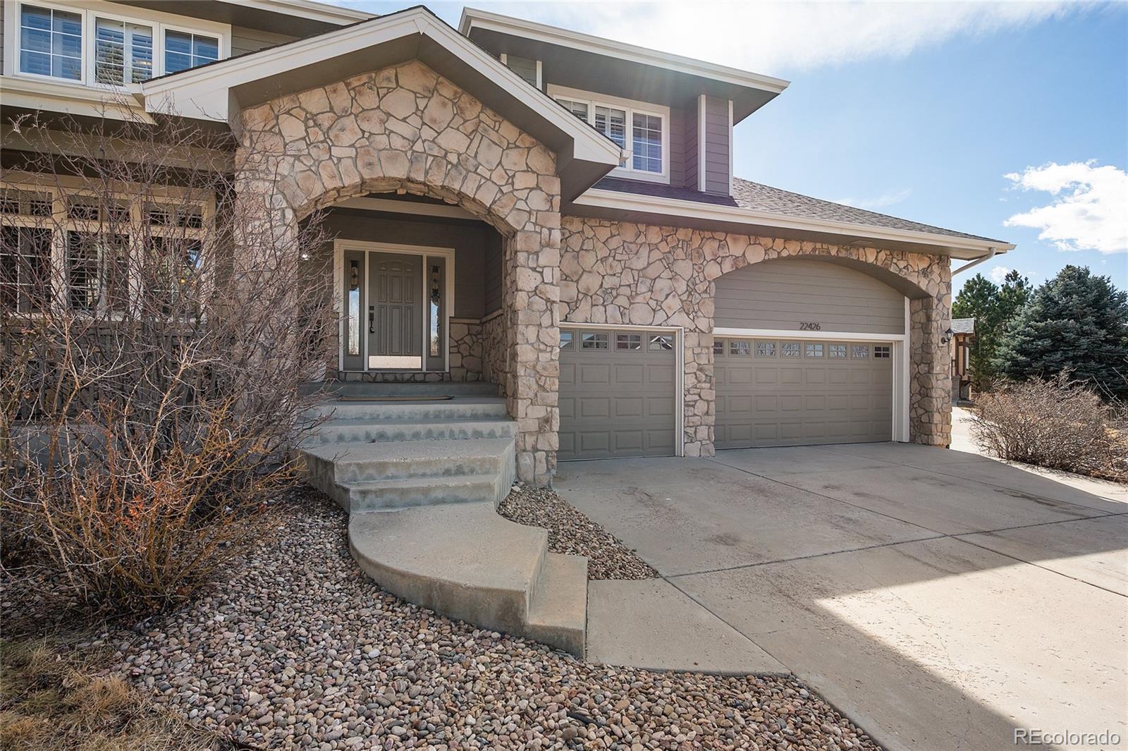 22426 East Roxbury Place Aurora, CO 80016 - Photo 2 of 50 a view of a house with a outdoor space