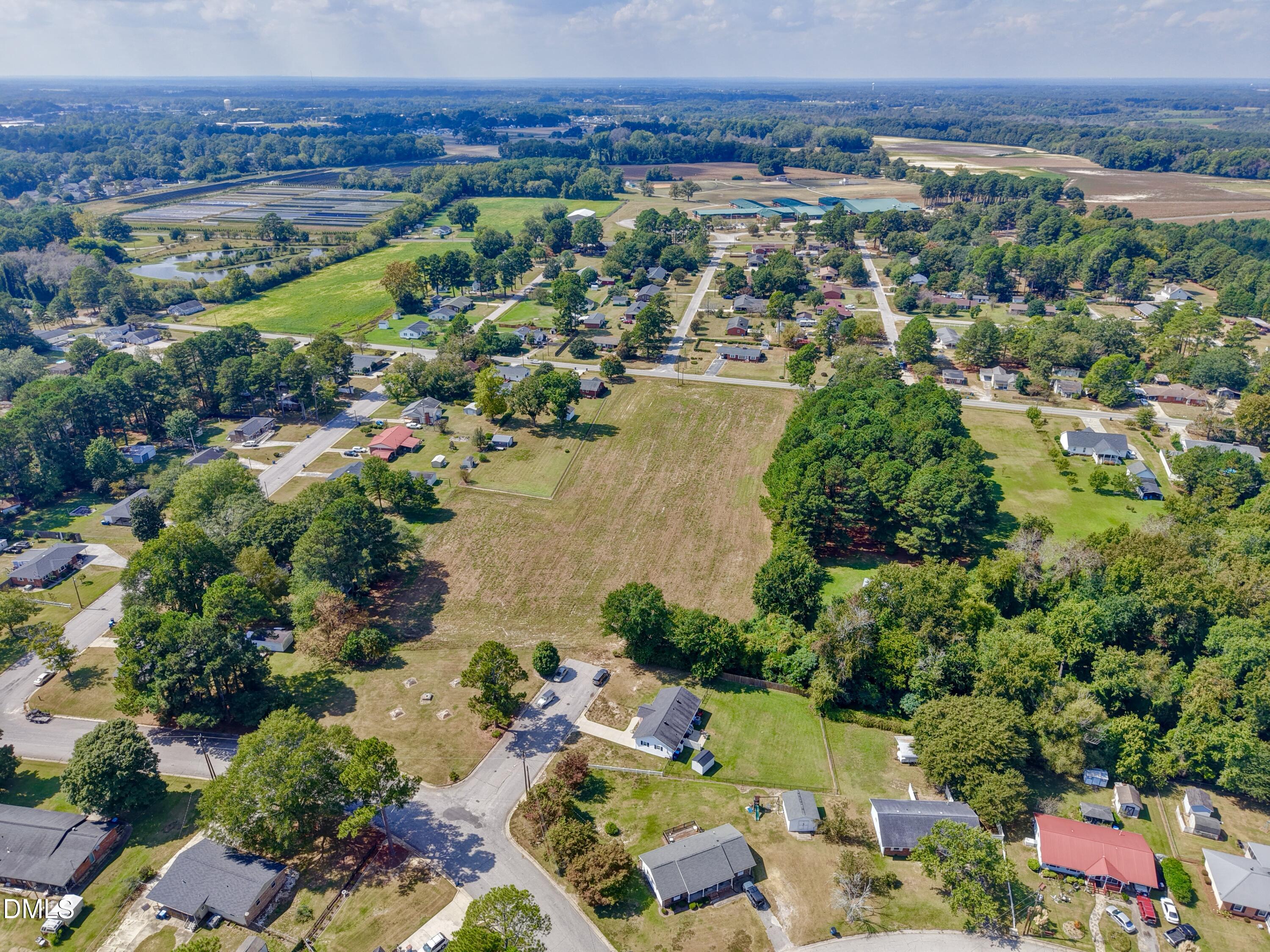 4.47-ac Fairground Road Dunn, NC 28334 - Photo 20 of 23 an aerial view of residential houses with outdoor space